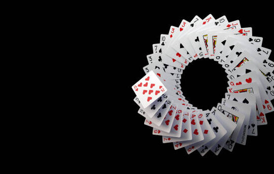 Modern White, Black And Red Playing Cards On Black Background. Empty Space.