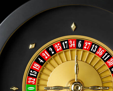 Close-up of a casino roulette seen from above.