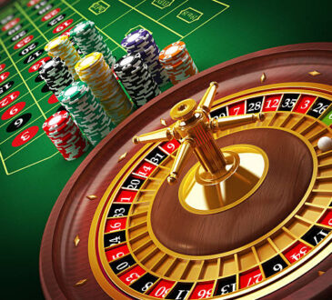 Roulette wheel and casino chips on the table.Similar images:
