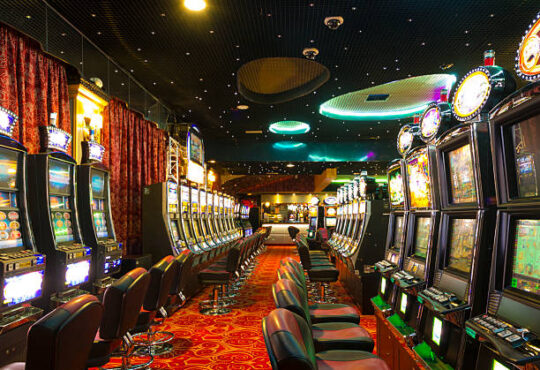 A Slot machines room in an empty Casino just before the opening time.