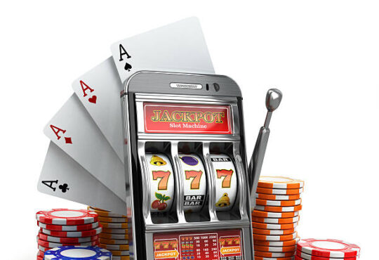 Online casino concept. Mobile phone, slot machine, dice and cards. 3d