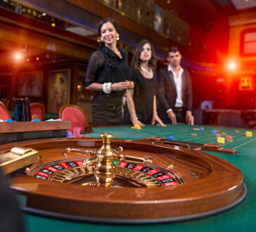 Group of young people playing roulette