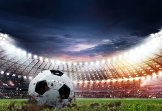 Soccer ball lies on stadium grass in the smoke, 3D Illustration